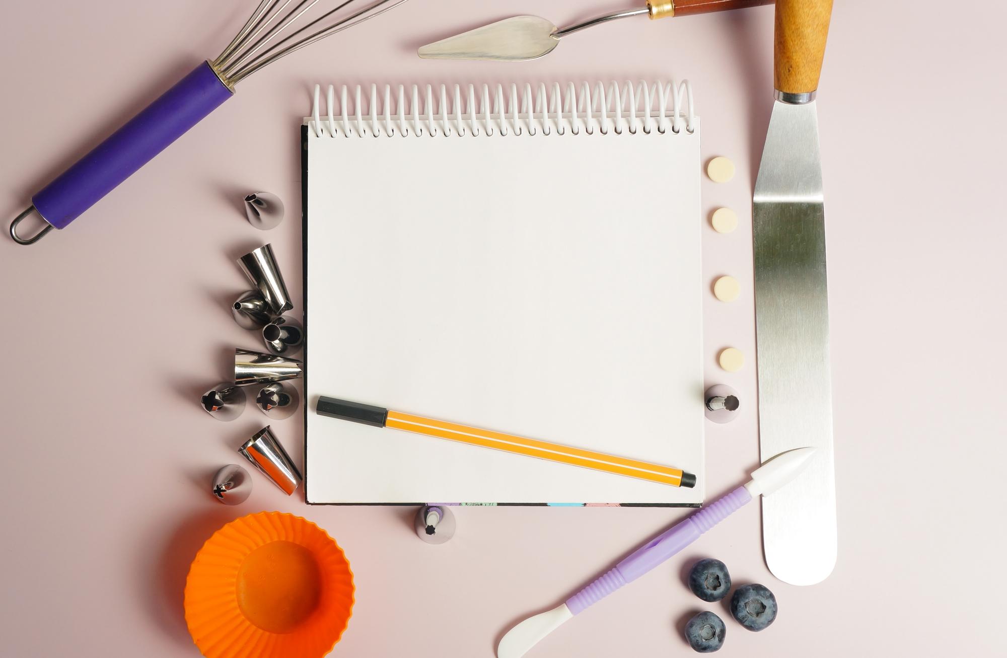 Notepad with menu sketches and color swatches